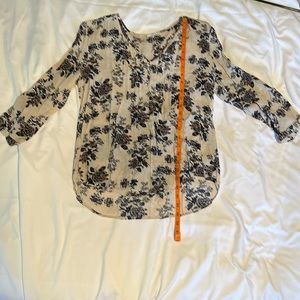 Women’s lightweight beige and floral print blouse